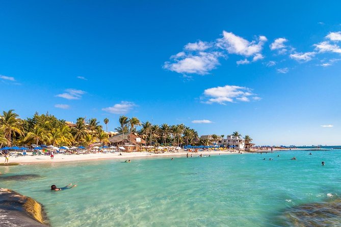 Catamaran Tour to Isla Mujeres, Open bar, Lunch, Snorkeling, Beach Club Included - Open bar, music, and the social side
