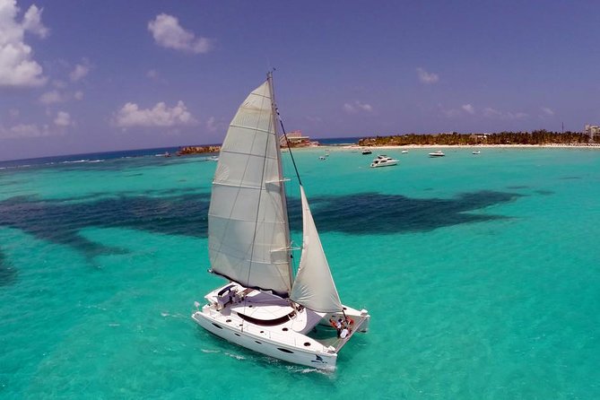 Catamaran Tour to Isla Mujeres, Open bar, Lunch, Snorkeling, Beach Club Included - Who should book this Isla Mujeres trip?