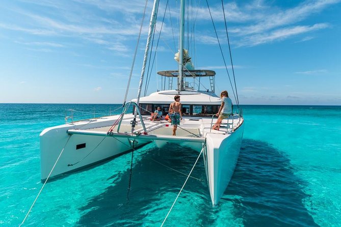 Catamaran Tour to Isla Mujeres, Open bar, Lunch, Snorkeling, Beach Club Included - El Meco Reef, a short swim in the Caribbean