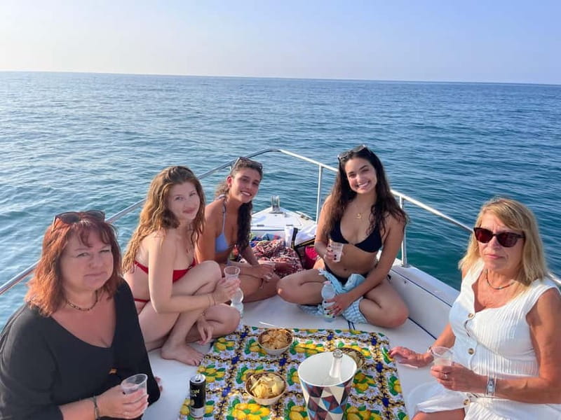 Cefalù: Mini Yacht Tour with Caves, Snorkeling, and Open Bar Aperitif - The Cefalù boardwalk and the Club Med coast