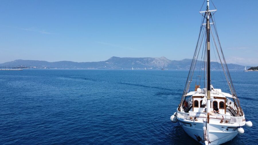 Corfu: Sunset Cruise on Classic Boat with Cocktails & Snacks - Cocktails, local drinks, and Greek snacks