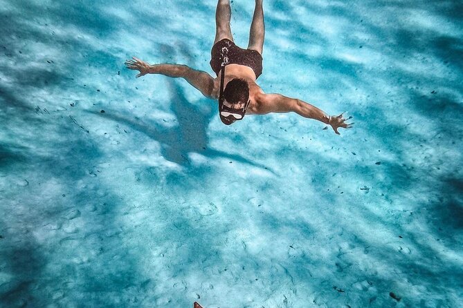 Cozumel Catamaran Tour: Snorkel at Top Reefs & Open Bar - Boat size, music, and the overall atmosphere