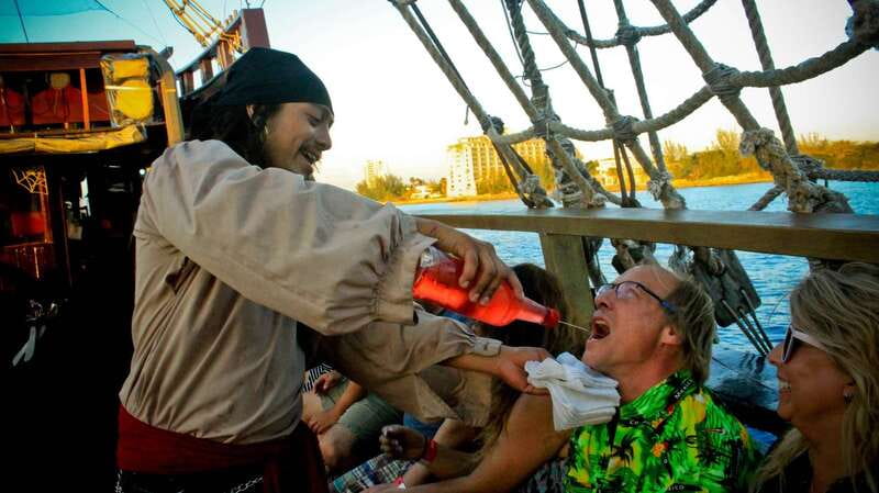 Cozumel: Pirate Ship Cruise with Open Bar, Dinner, and Show - The opening show: stories, games, and sword fights