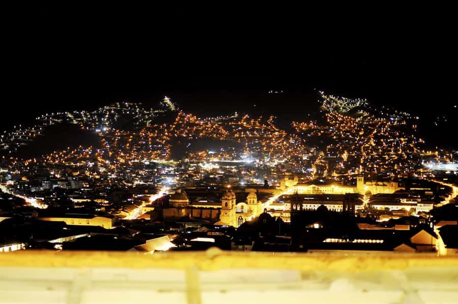 Cusco: Pub Crawl with Skip-the-Line Access and Drinks - Walking through Cusco after dark