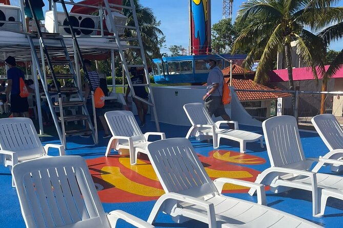Dancer Cruise Isla Mujeres Snorkel Food and Drinks Included - The slide and jumping board add a second water stop