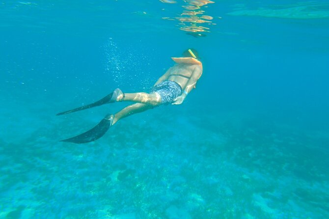 Dancer Cruise Isla Mujeres Snorkel Food and Drinks Included - Isla Mujeres offers a short taste of the island