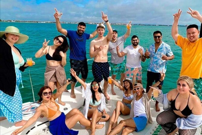 Deluxe Catamaran to Isla Mujeres, with Drinks, Snorkel & Buffet - A Mexican buffet at the beach club