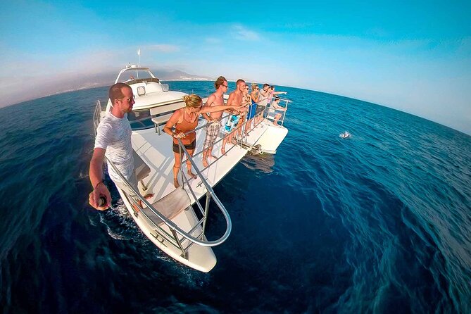 Deluxe Catamaran to Isla Mujeres with Open Bar from Cancun - Snorkeling in clear water, with a practical warning