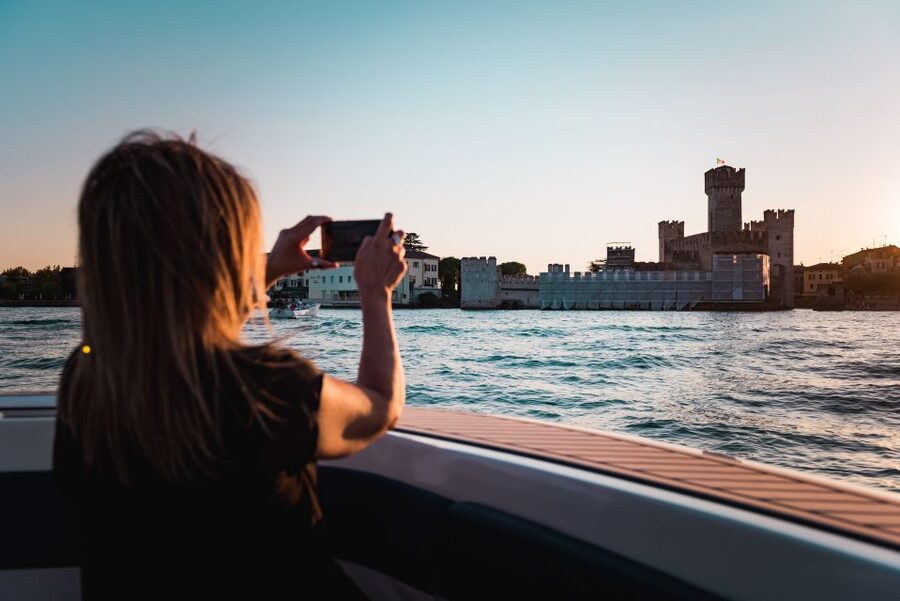 Desenzano del Garda: Sunset Boat Trip at Sunset with Drink - Setting out from Desenzano harbor