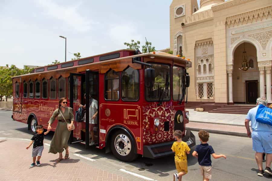 Dubai: Heritage Express Cultural Trolley Tour with Drinks - Dubai Creek, abra boats, and the water route