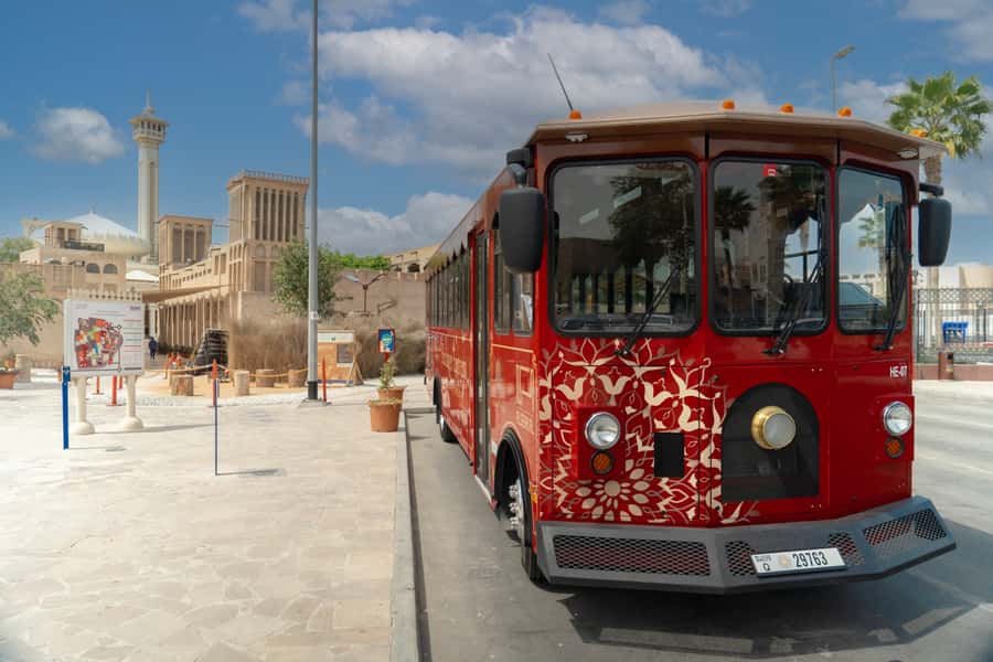 Dubai: Heritage Express Cultural Trolley Tour with Drinks - Beginning with a Bedouin desert show