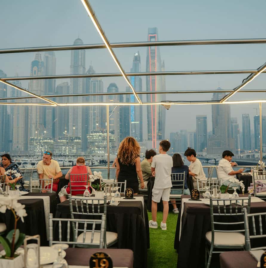 Dubai: Sunset or Dinner Cruise with Live Music & Open Bar - Dinner: A Broad Buffet With Live Stations