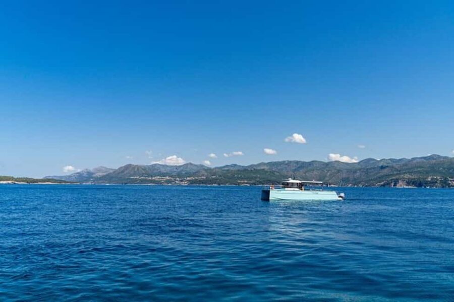 Dubrovnik: Blue Cave Catamaran Tour with Drinks and Snorkel - Blue Cave on Koločep: light, rock, and timing