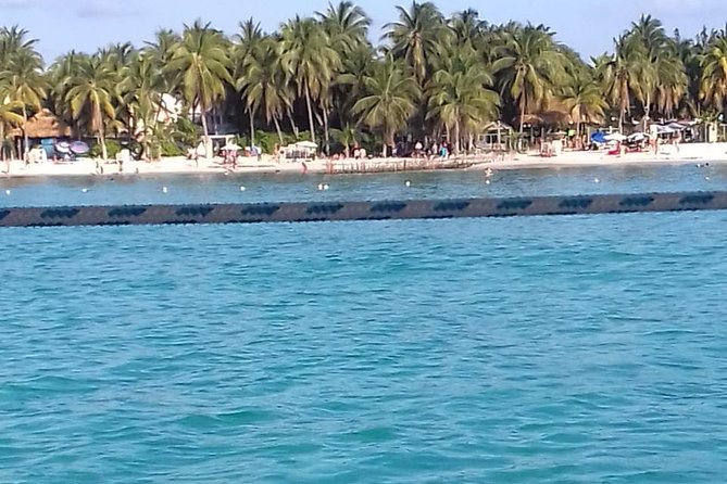 Enjoy an amazing day in Isla Mujeres with snorkeling food, drinks and round trip - Hotel pickup and the early start