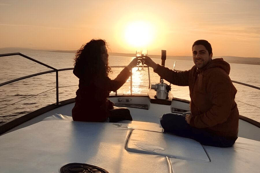 Estepona: Dolphin Searching Sunset Cruise with Drink & Snack - Meeting the crew at Puerto Deportivo de Estepona