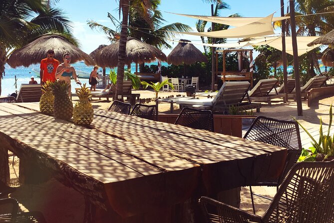 Exclusive Open Bar Experience at Yaya Beach - Table service, restrooms, and practical comforts