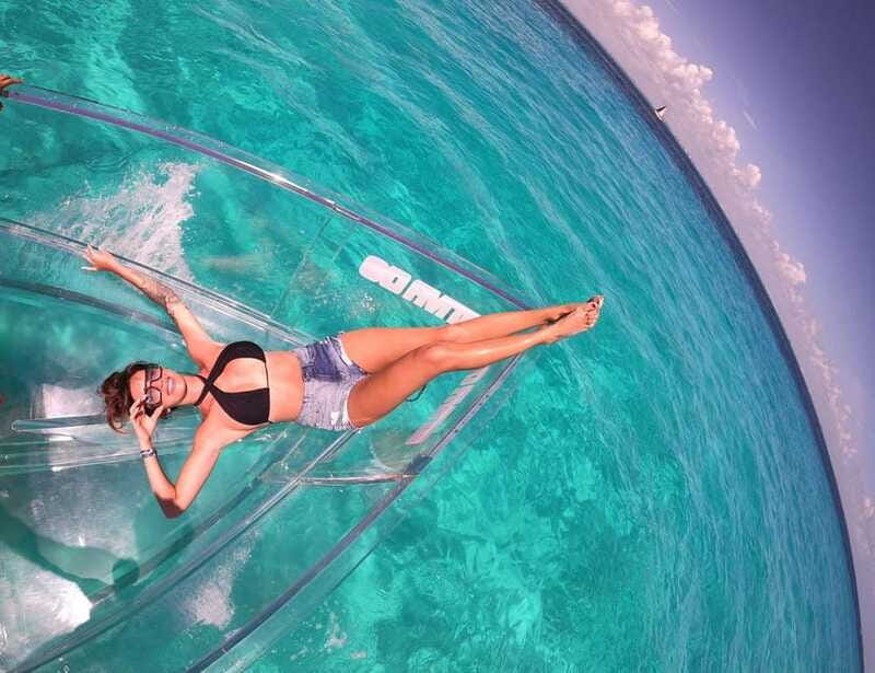 Explore the sea of cozumel in a transprent boat with drinks and snorkel. - Key points at a glance