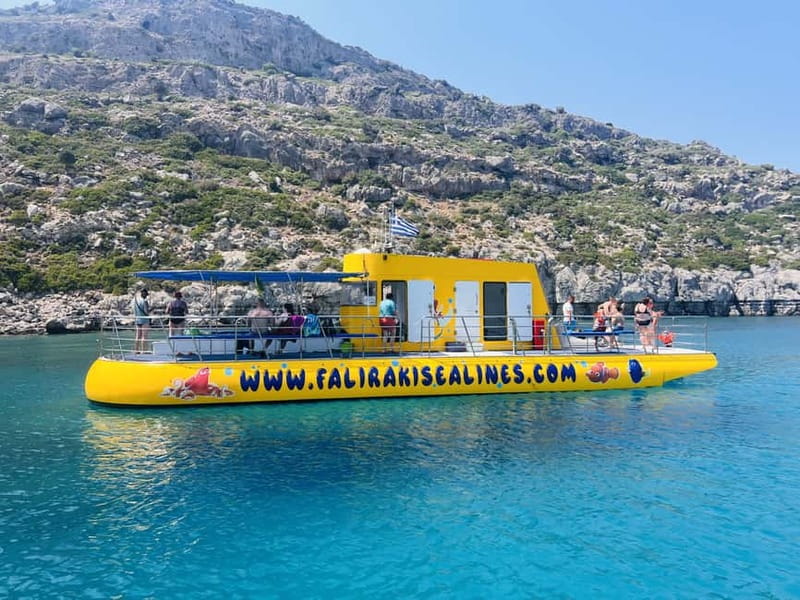 Faliraki: Boat Trip to Anthony Quinn & The Caves with Drinks - A yellow boat with two ways to see the sea