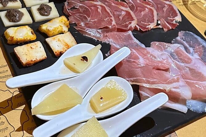 Florence Food Tour with Truffle Pasta, Steak & Free Flowing Wine - Crostini, pesto, and a Florentine wine window