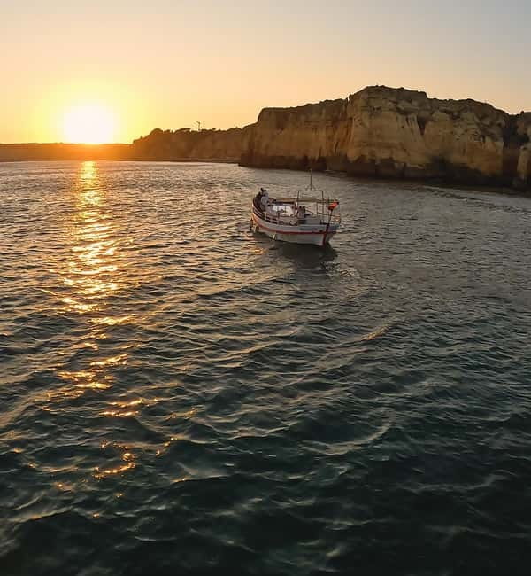 From Lagos: Ponta da Piedade Sunset Cruise with Drink - Watching the sun set over the Atlantic