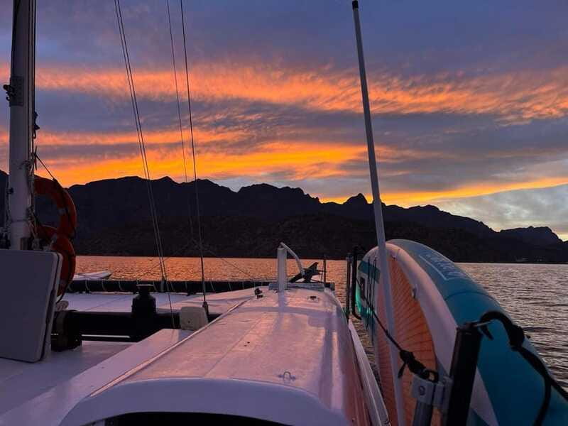 From Loreto: Sunset Appetizers & Open Bar Catamaran Cruise - Music, dancing, and the ride back