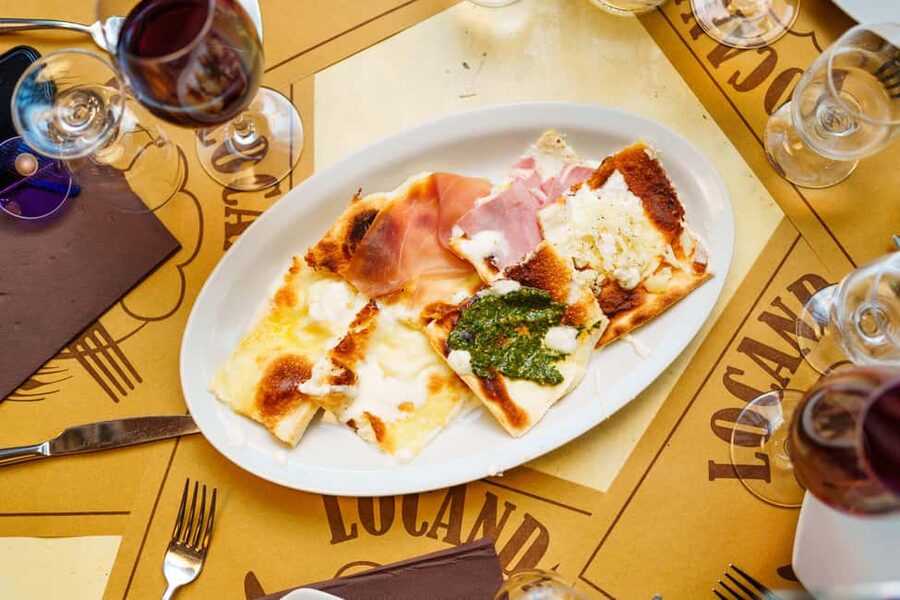 Genoa Gourmet Delights: Full Culinary Experience with Drinks - Focaccia with cheese, a Ligurian specialty