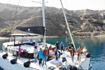 Half-Day Exclusive Catamaran Cruise in Santorini with Meal and Open Bar