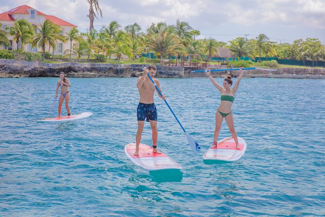 Half-Day Luxury Sailing Experience in Tulum with Open Bar - Boarding the catamaran near Puerto Aventuras