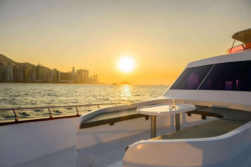 Hong Kong: Victoria Harbour Evening Cruise with Drinks - The yacht, seating, and best views