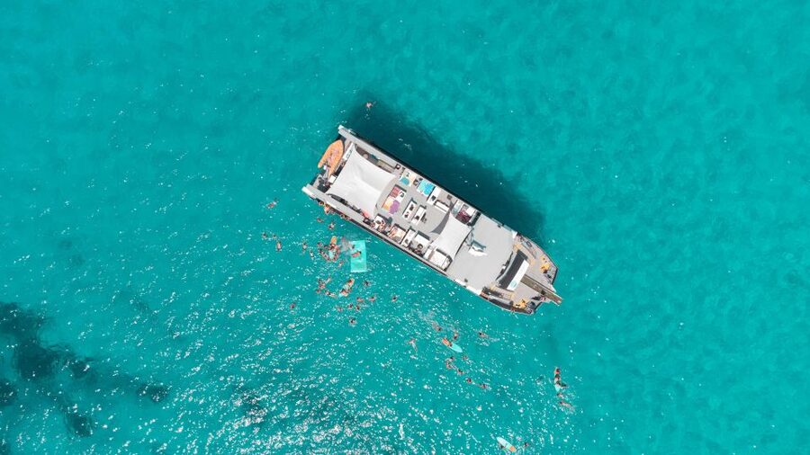 Ibiza: Crystal Waters Formentera, Open Bar and Buffet Lunch - Cala Saona: your first swim from the boat