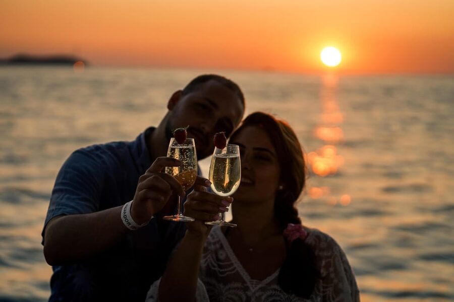 Ibiza: Secret Coves Guided Boat Tour with Open Bar and Tapas - Cala Bassa and the beach-club setting