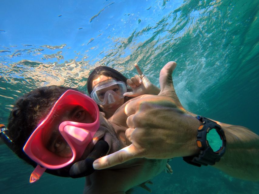 Ibiza: SUP & Snorkel Boat Tour with Caves, Drinks & Photos - Fruit, tapas and drinks on the boat