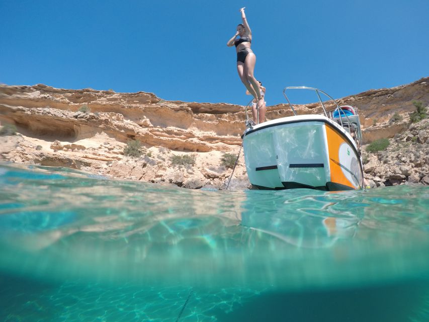 Ibiza: SUP & Snorkel Boat Tour with Caves, Drinks & Photos - Photos from the boat, boards and underwater