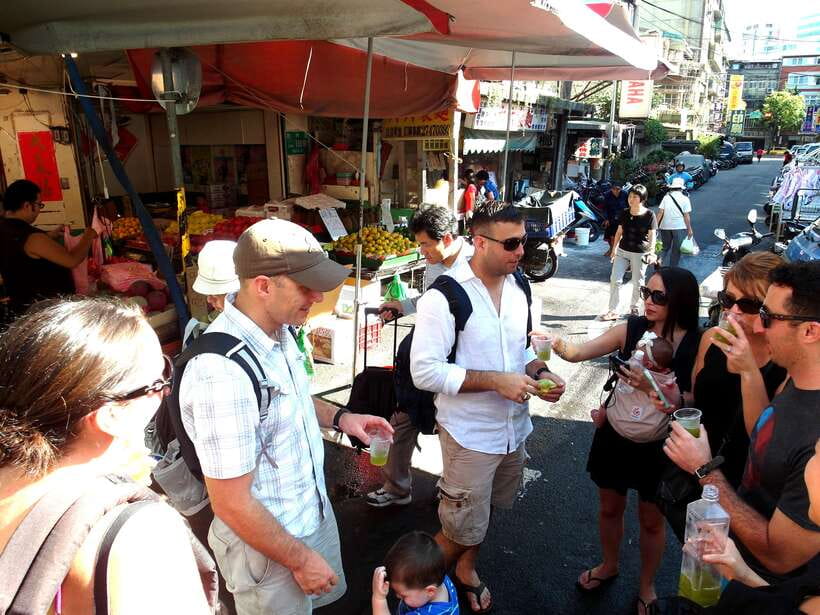 Iconic Food Tour: Local Street Food, Drinks & Sites - Xinyi’s wet market, where the food story begins