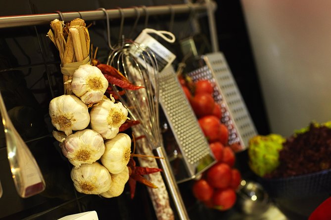 Interactive Paella & Market: Bottomless Wine & Rambla Views - Preparing the five-part menu