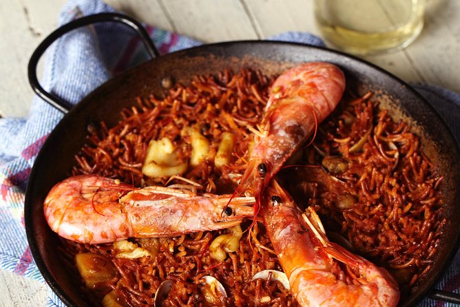 Interactive Paella & Market: Bottomless Wine & Rambla Views - Why the four-hour schedule matters