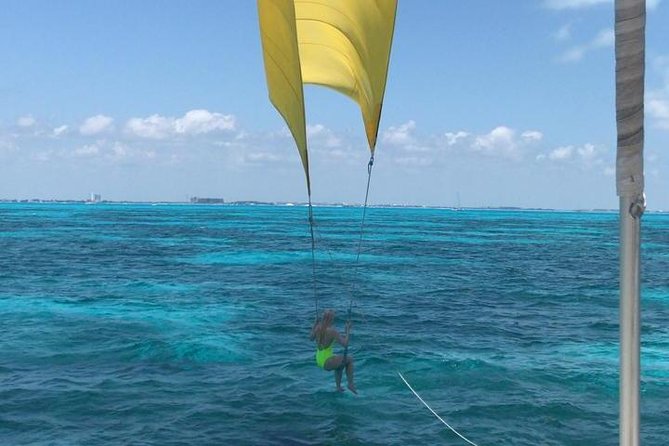 Isla Mujeres adventure by Catamaran. Snorkel, open bar and lunch - Spinnaker sailing, the day’s wild card
