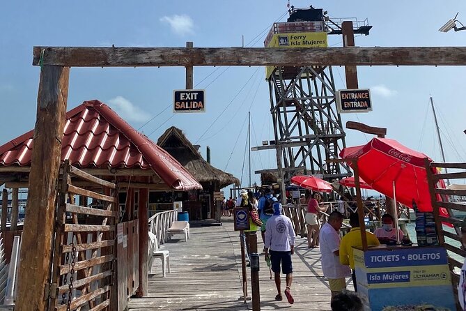Isla Mujeres Basic Tour in Catamaran with Snorkel and Open Bar - A short swim at Playa Norte