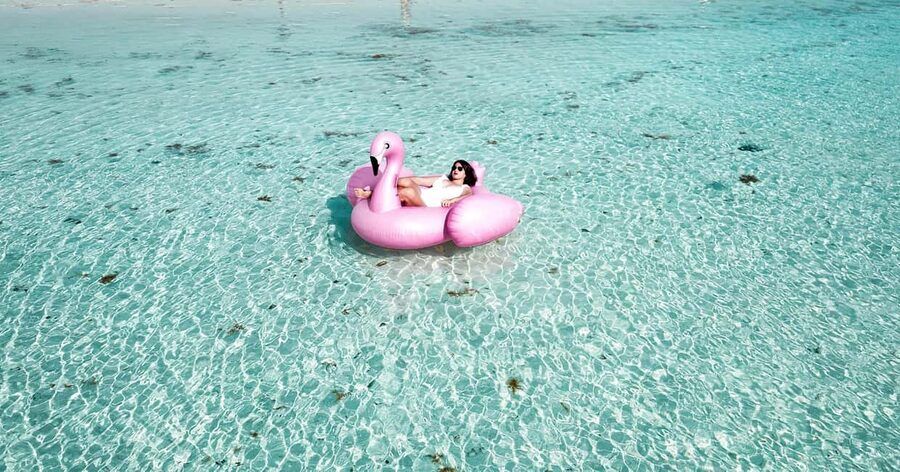 Isla Mujeres: Catamaran Ride with Open Bar, Snorkeling, and Lunch - The return sail and the real value of $56
