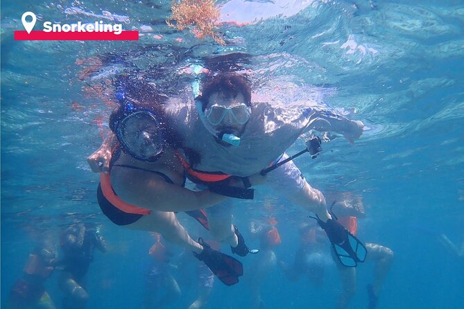 Isla Mujeres Catamaran + Snorkel + Open Bar on board + Buffet - The Party Atmosphere and Family Considerations