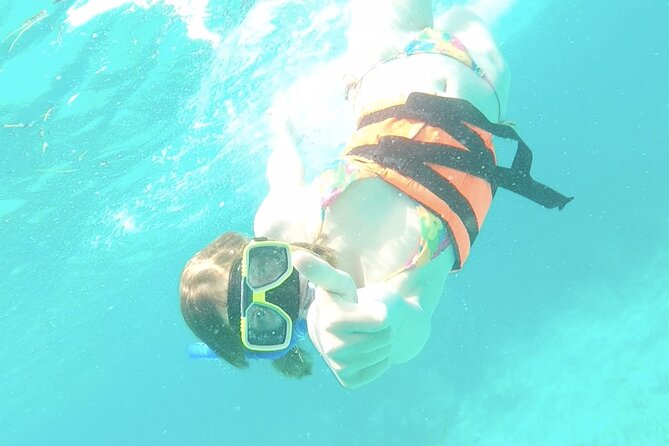 Isla Mujeres Catamaran Tour from Cancun with snorkel and Open Bar - Two hours at Albatros Beach Club