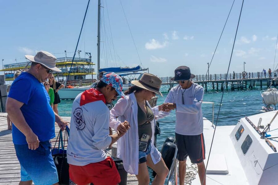 Isla Mujeres Catamaran Tour with Snorkeling & Open bar - One hour around the MUSA sculptures