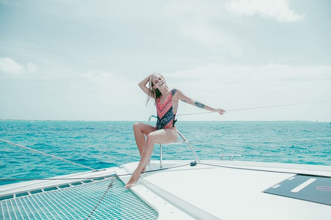 Isla Mujeres Cruise with Beach Club, Snorkel, Lunch and Open Bar - Snorkeling at Arrecife El Meco