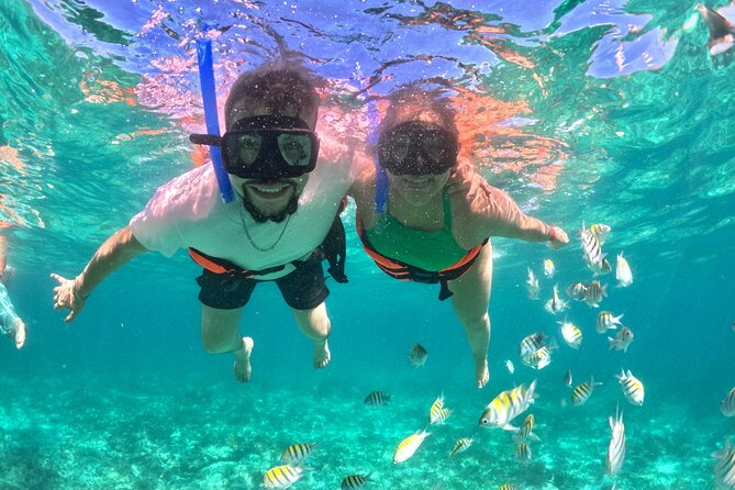 Isla Mujeres Spring Break Party Catamaran Snorkel and Open Bar - Lunch at the beach club