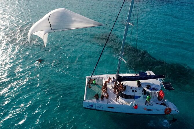 Isla Mujeres Tour on Catamaran with Snorkel, Open Bar, Buffet & Beach club - Snorkeling at El Meco Reef