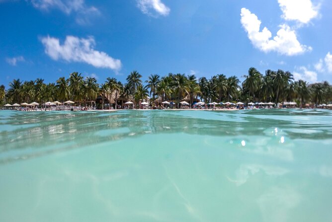 Isla Mujeres Tour on Catamaran with Snorkel, Open Bar, Buffet & Beach club - The return cruise and sunset timing