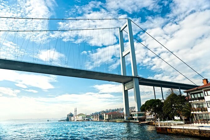 Istanbul Bosphorus Cruise Dinner, Drinks & Show with Pickup - The first views: bridges, Beşiktaş, and the European shore