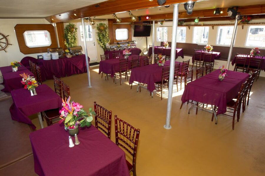 Key West: Sunset Dinner Cruise with Open Bar & Live Music - What is served at the tropical buffet