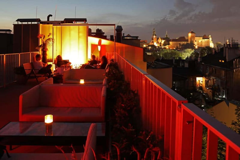 Krakow: Hidden Rooftop Bar Reservation with 1 Cocktail - A cocktail with your admission