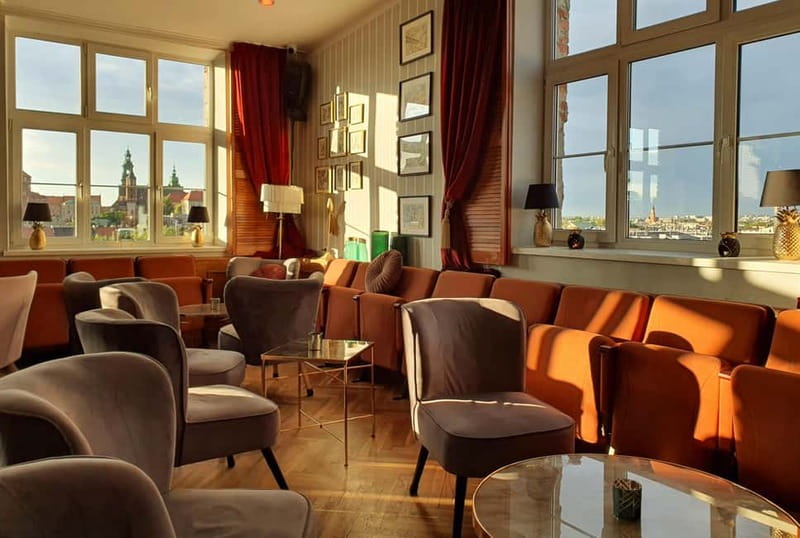 Krakow: Hidden Rooftop Bar Reservation with 1 Cocktail - Inside, outside, and the unusual decor